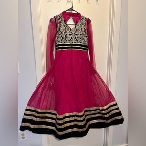 Hot pink velvet bordered anarkali dress. design with contrast black velvet.